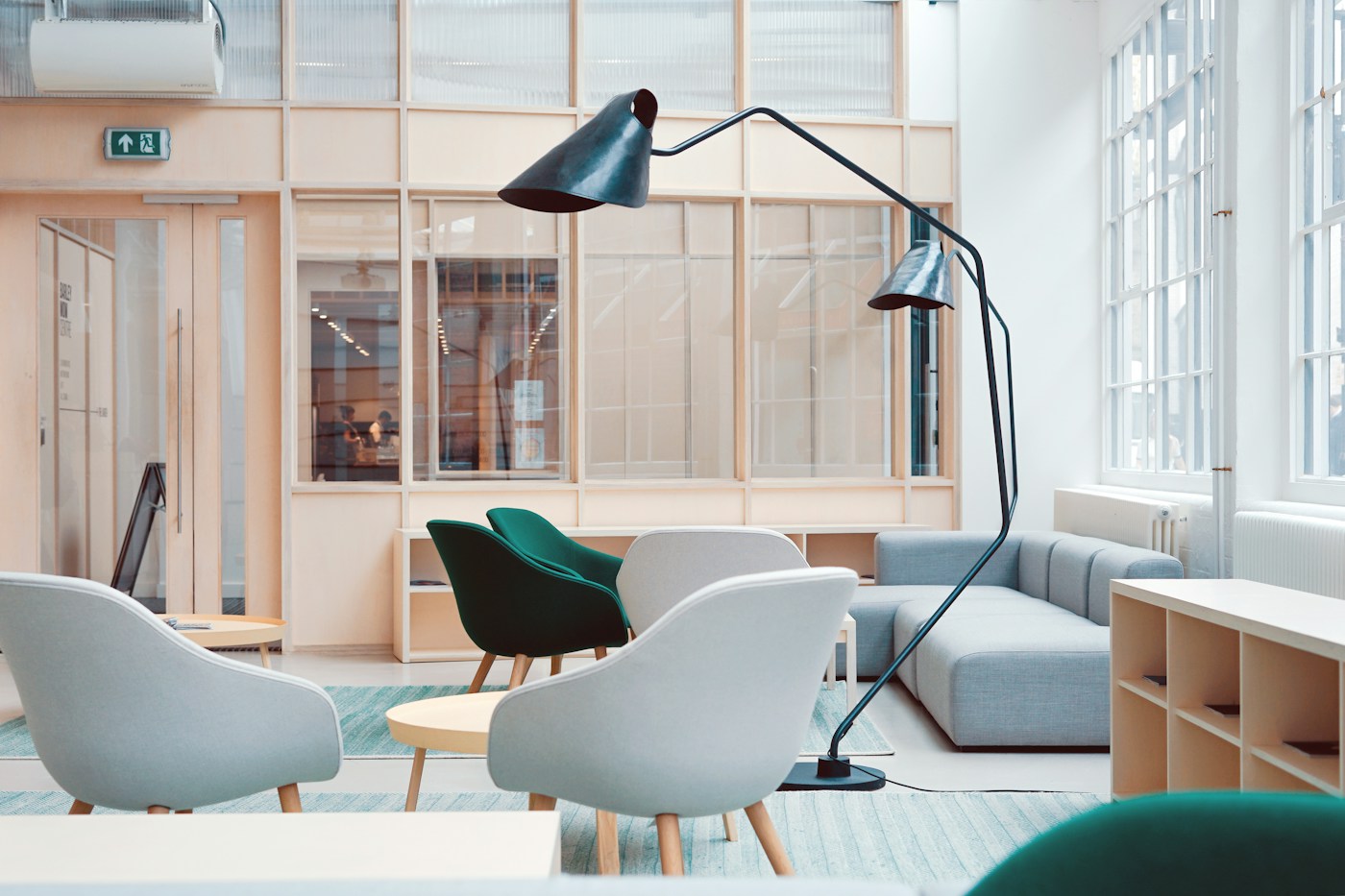 Open creative workspace with shared tables, natural light and room for collaborative planning